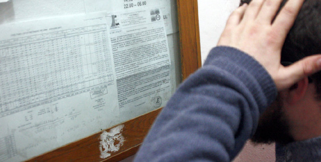 Legea încurajează acumularea datoriilor la bloc